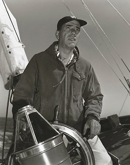 Humphrey Bogart At The Helm Of His 55 Foot Yacht Santana 1952 By Sid