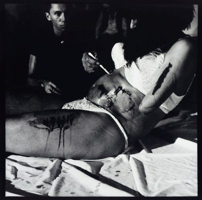 Alternate image of The unword performance (11 female sexual organs) by Mike Parr