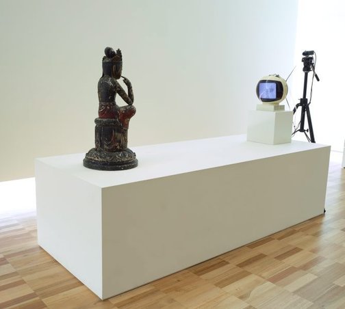 An image of TV Buddha by Nam June Paik